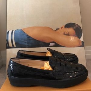 VINTAGE TOD'S black patent loafers.